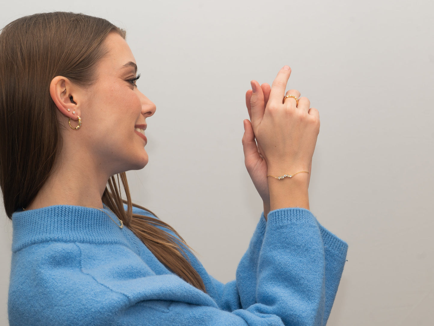 Vergoldetes Silber-Armband mit weißen Steinen miaGemo