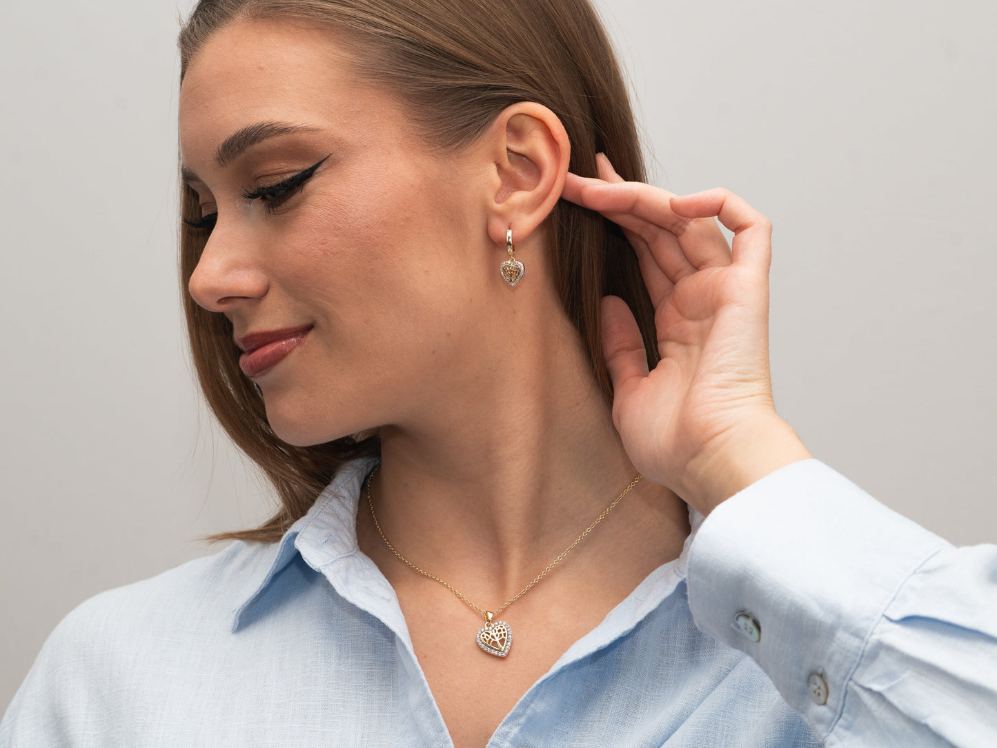 Vergoldete Silber-Ohrringe mit Herz und weißem Zirkonia miaGemo