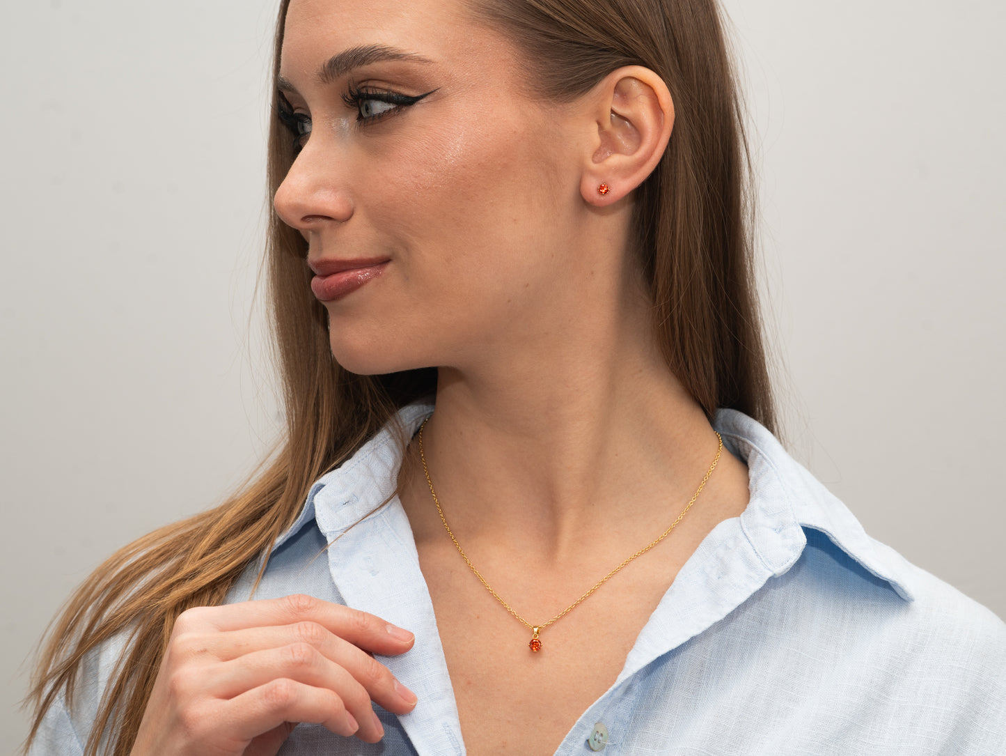 Silber-Ohrringe 3 mm mit orangem Zirkonia, vergoldet miaGemo