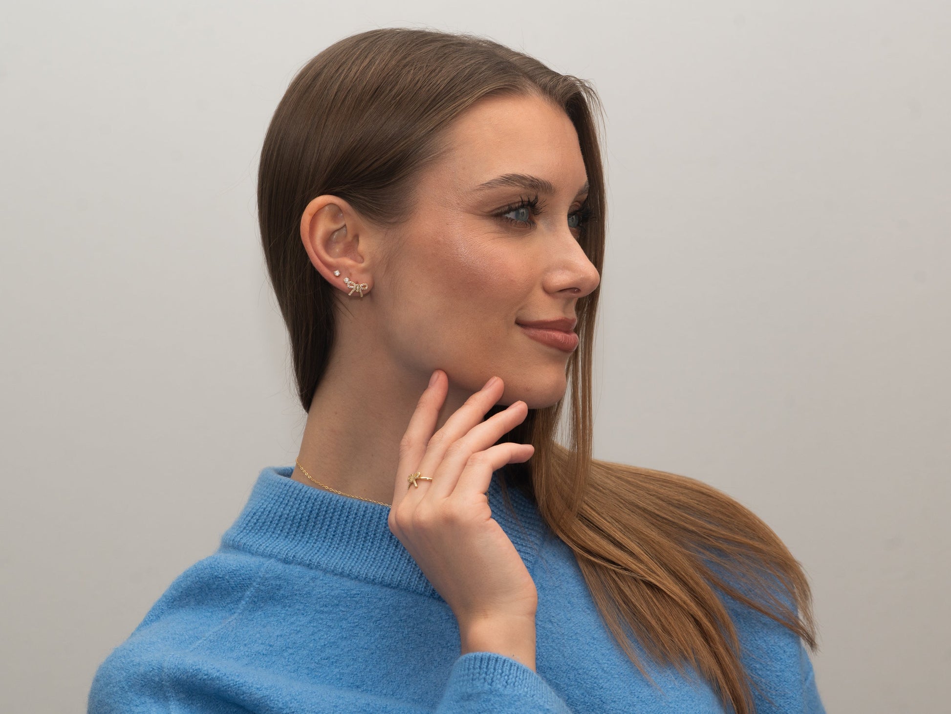 Vergoldete Silber-Ohrringe Schleife mit weißem Zirkonia miaGemo