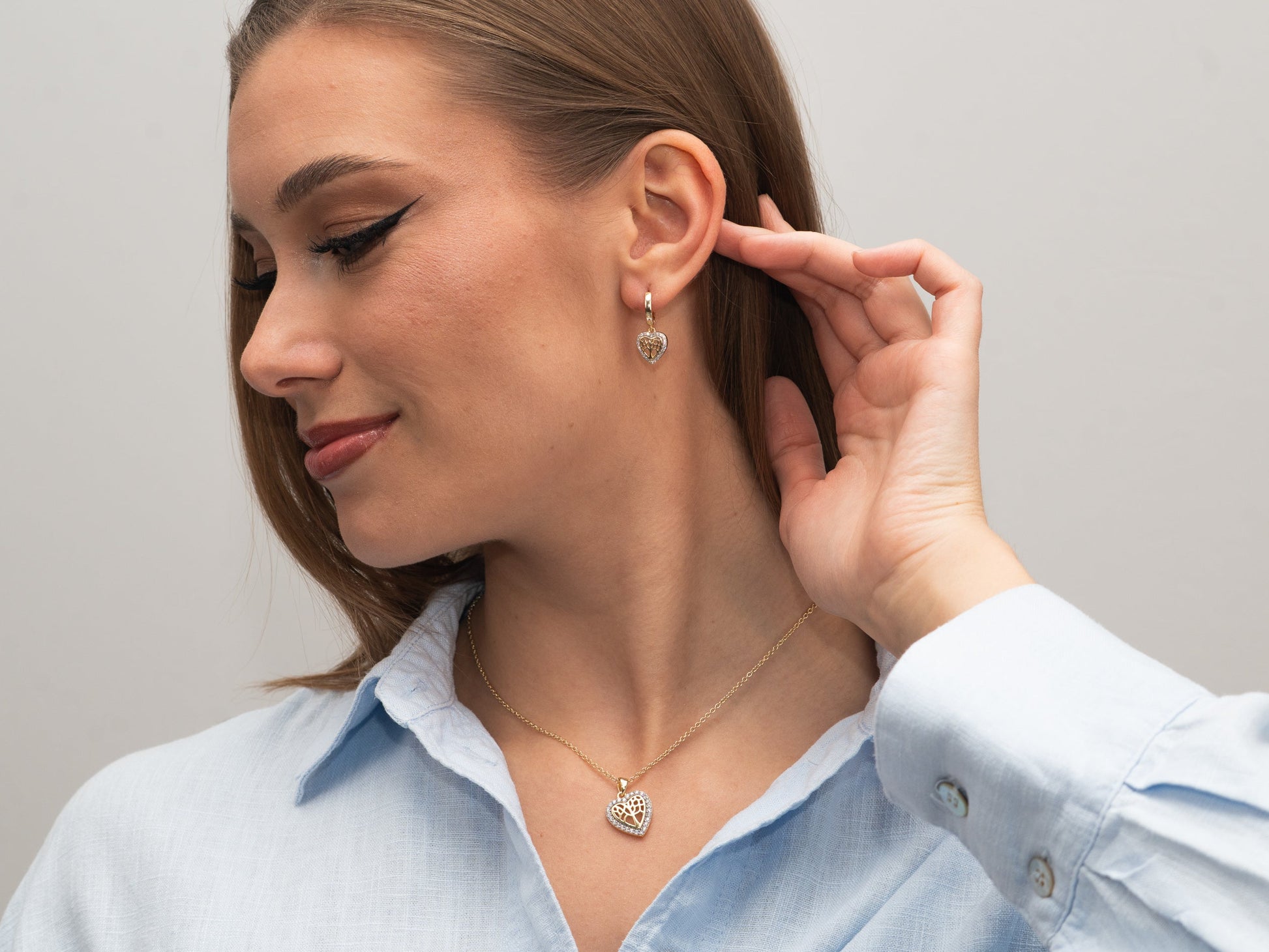 Vergoldete Silber-Ohrringe mit Herz und weißem Zirkonia miaGemo